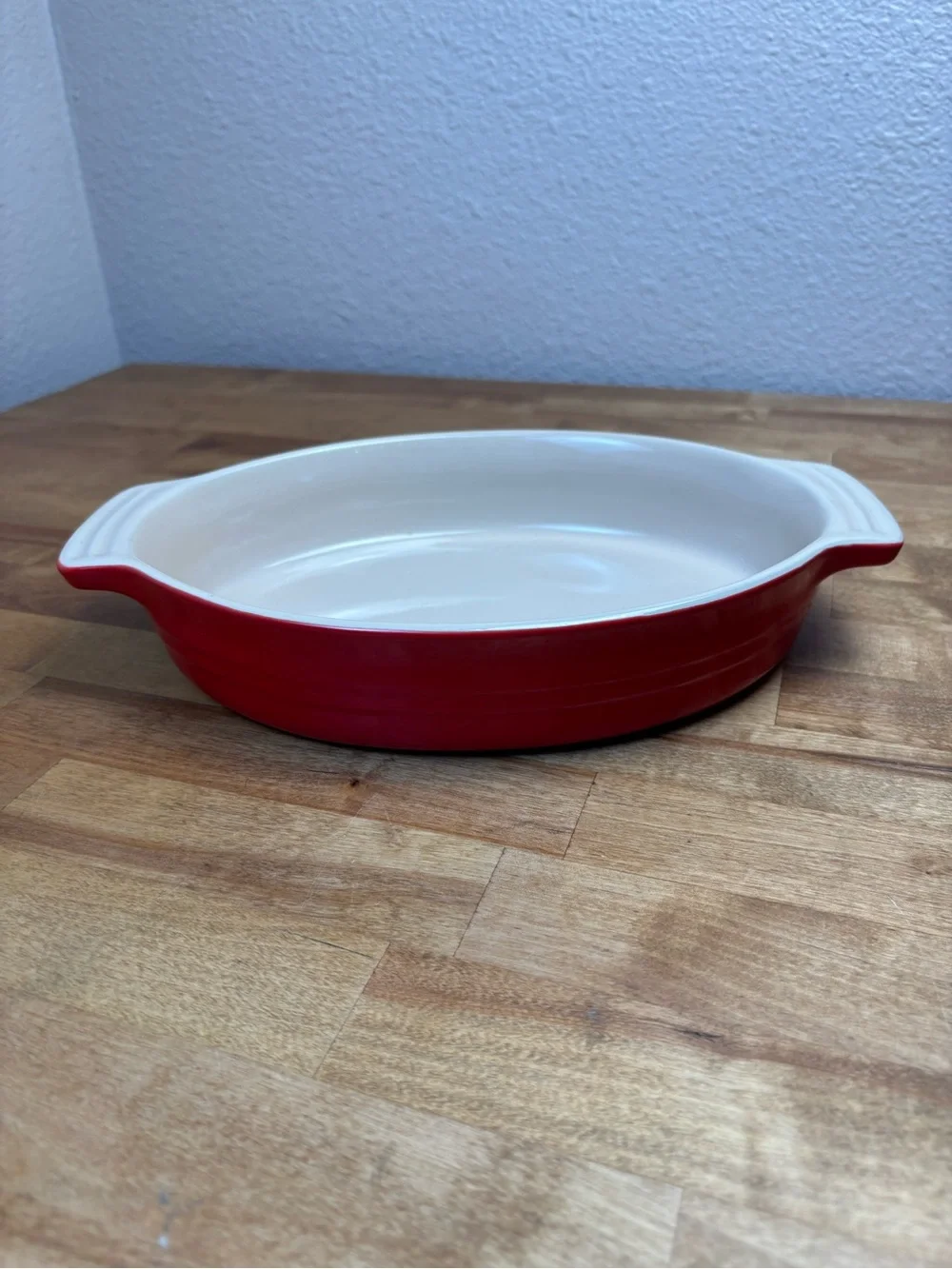 Le Creuset Red and Cream Oval Ceramic Baking Dish